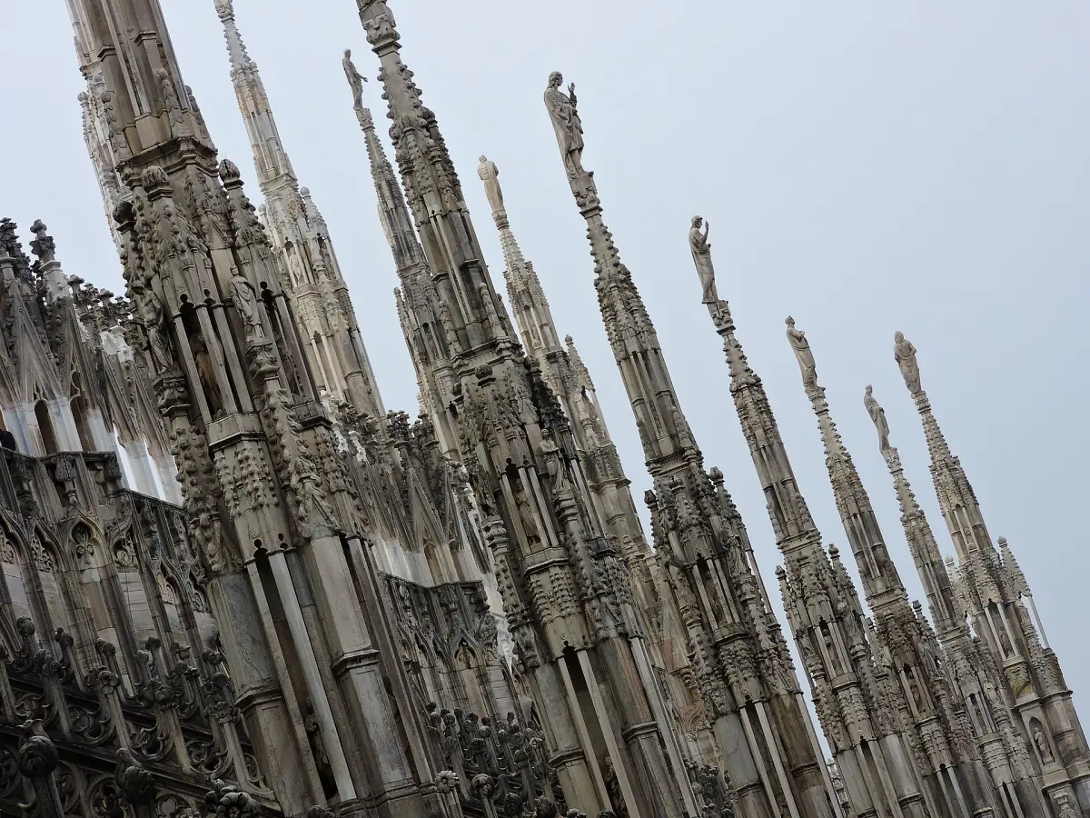 Rows of marble spires on the cathedral roof